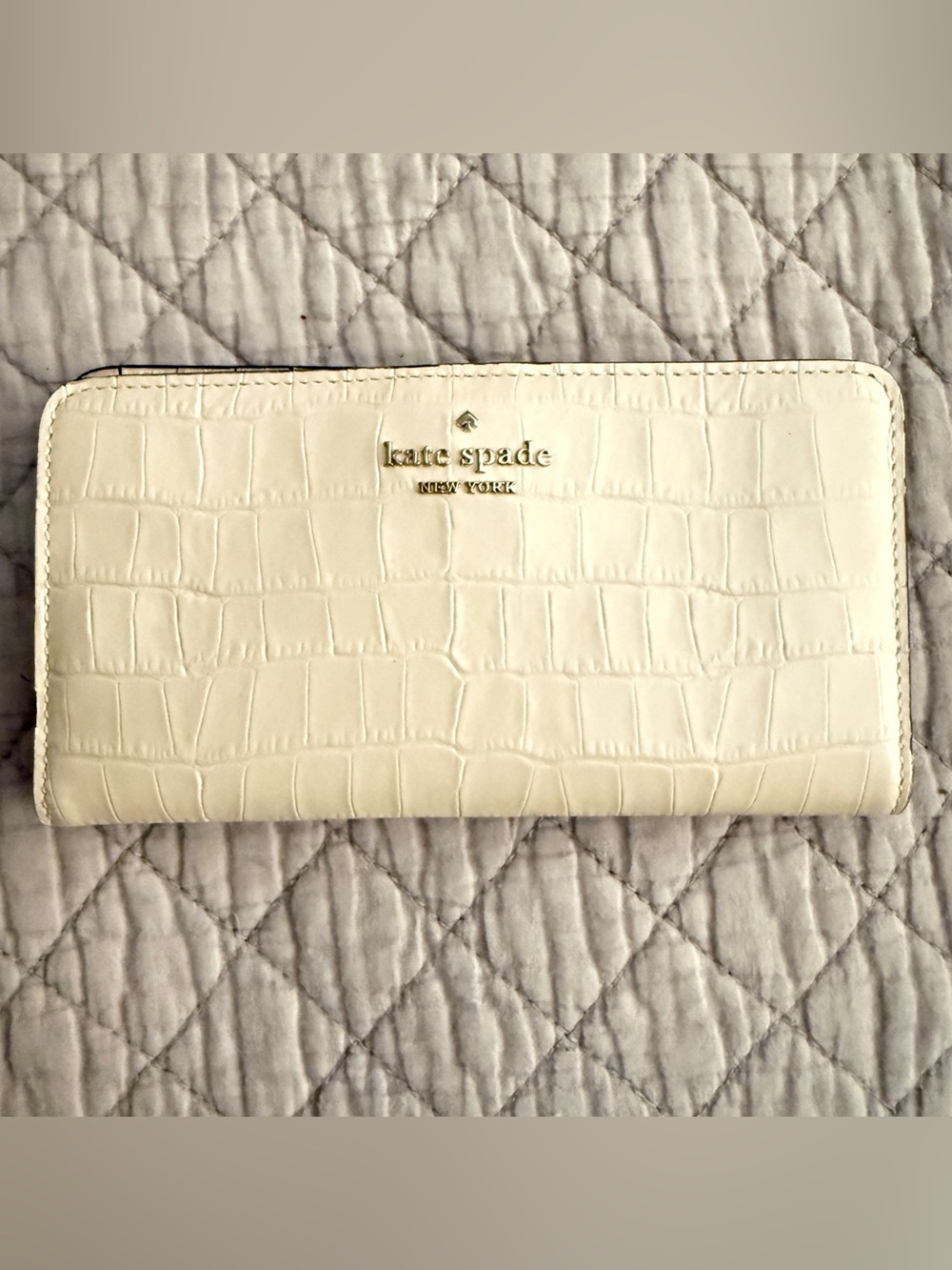 Kate Spade cream crocodile bifold wallet